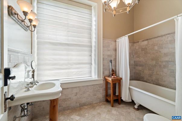 Bathroom, Chandelier, Free Standing Baths, Interior, Stone Walls