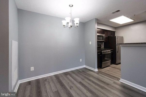Chandelier, Empty room, Interior, Kitchen, Stainless Steel Appliances, Wood Texture Flooring