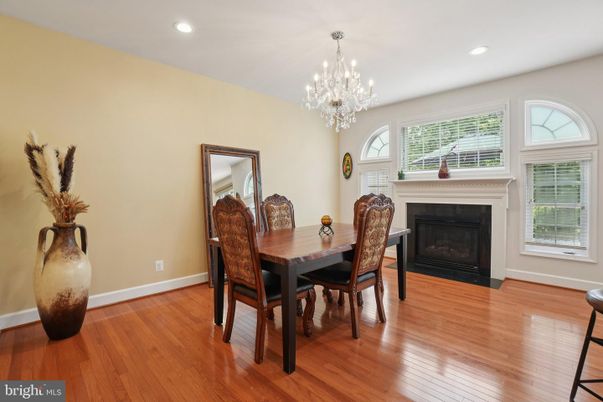 Chandelier, Dining room, Fireplace, Interior, Recessed Lighting, Wood Texture Flooring