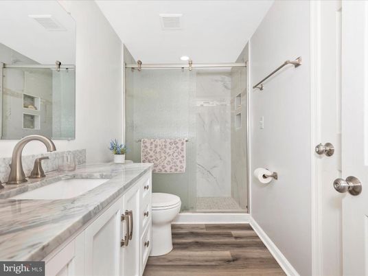 Bathroom, Glass Shower, Interior, Marble Walls, Wood Texture Flooring