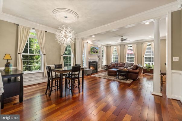 Chandelier, Dining room, Fireplace, Interior, Living room, Recessed Lighting, Wood Texture Flooring