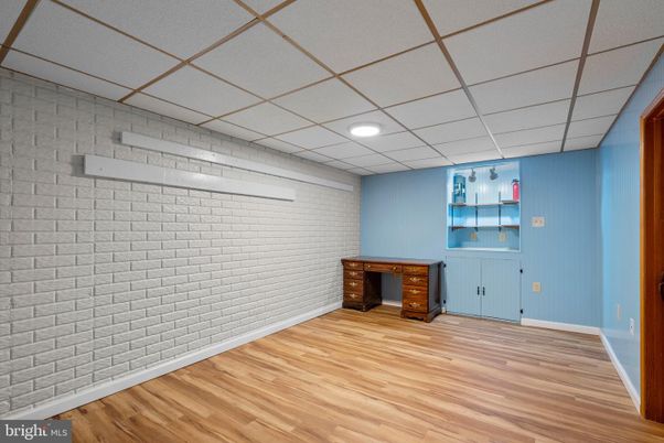 Empty room, Interior, Recessed Lighting, Stone Walls, Wood Texture Flooring