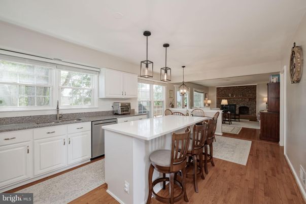 Dining room, Fireplace, Interior, Kitchen, Pendant Lights, Stone Walls, Wood Texture Flooring
