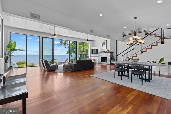 Chandelier, Dining room, Fireplace, Interior, Living room, Pendant Lights, Recessed Lighting, Water, Wood Texture Flooring