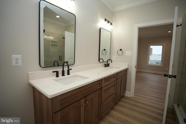 Bathroom, Dual Sink Vanities, Interior, Recessed Lighting, Wood Texture Flooring