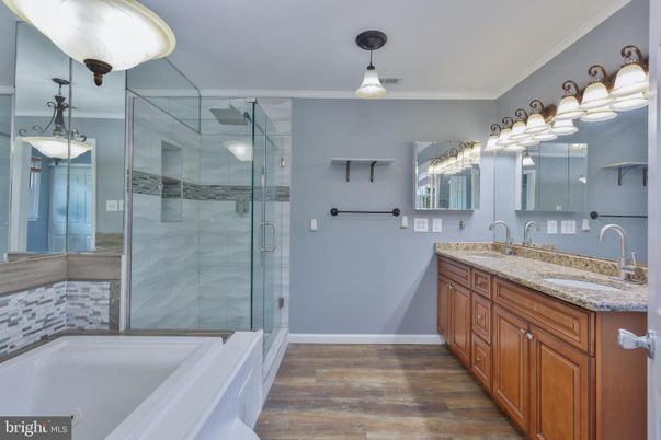 Bathroom, Dual Sink Vanities, Glass Shower, Interior, Wood Texture Flooring