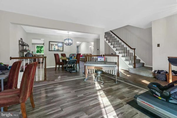 Dining room, Interior, Pendant Lights, Piano, Wood Texture Flooring