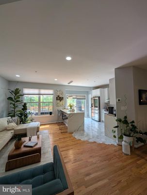 Dining room, Interior, Kitchen, Living room, Recessed Lighting, Stainless Steel Appliances, Wood Texture Flooring