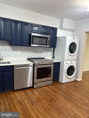 Interior, Kitchen, Stainless Steel Appliances, Washer, Wood Texture Flooring