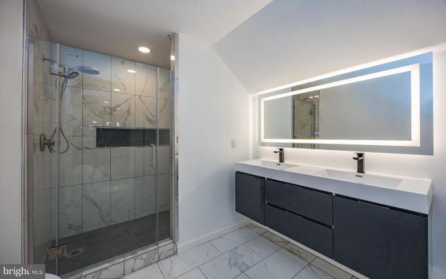 Bathroom, Dual Sink Vanities, Glass Shower, Interior, Marble, Marble Walls, Recessed Lighting