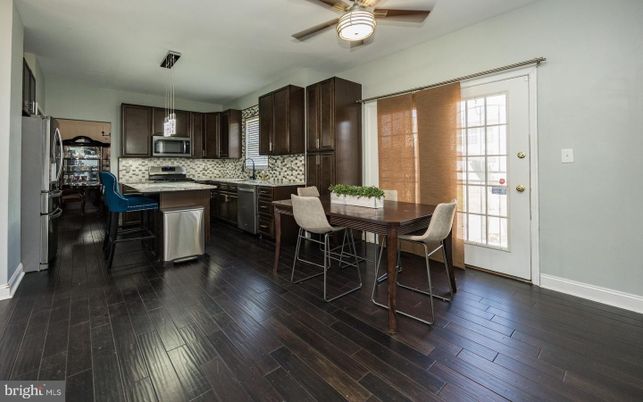 Dining room, Interior, Kitchen, Pendant Lights, Stainless Steel Appliances, Wood Texture Flooring