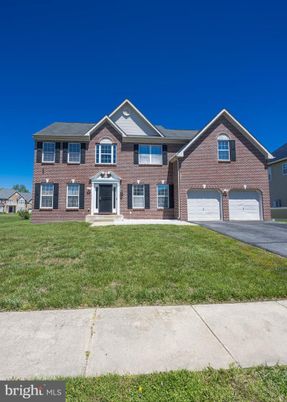 Attached, Exterior, Facade, Brick Facade, Brick Traditional