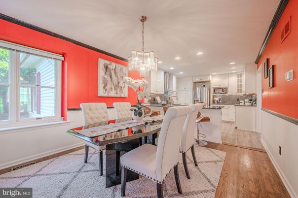 Chandelier, Dining room, Interior, Kitchen, Pendant Lights, Recessed Lighting, Stainless Steel Appliances, Wood Texture Flooring