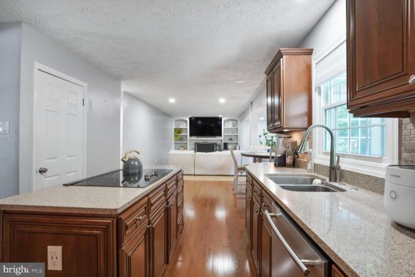 Fireplace, Interior, Kitchen, Living room, Recessed Lighting, Wood Texture Flooring