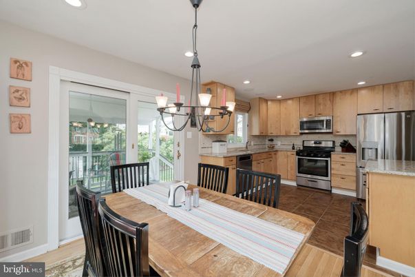 Chandelier, Dining room, Interior, Kitchen, Recessed Lighting, Stainless Steel Appliances, Wood Texture Flooring