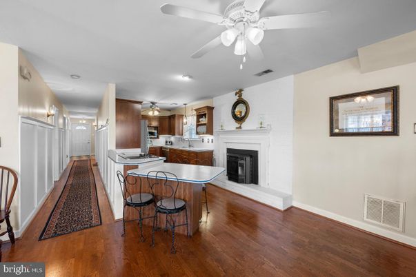 Fireplace, Interior, Kitchen, Recessed Lighting, Wood Texture Flooring