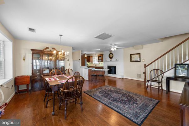 Chandelier, Dining room, Fireplace, Interior, Wood Texture Flooring