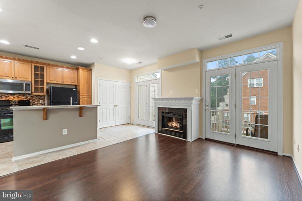 Empty room, Fireplace, Interior, Kitchen, Recessed Lighting, Wood Texture Flooring