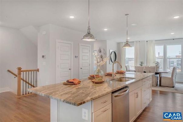Dining room, Interior, Kitchen, Pendant Lights, Recessed Lighting, Stainless Steel Appliances, Wood Texture Flooring