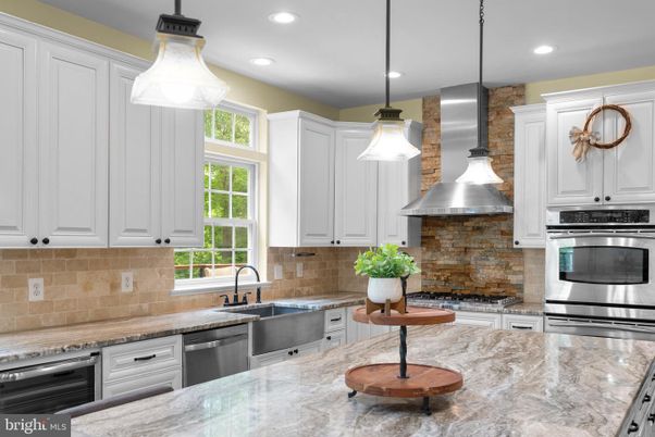 Interior, Kitchen, Pendant Lights, Recessed Lighting, Stainless Steel Appliances, Stone Walls