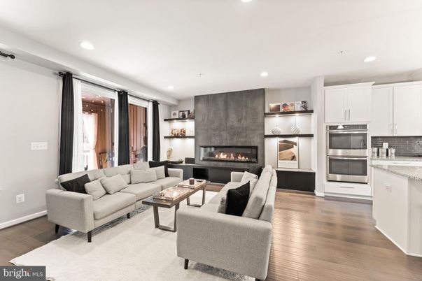 Fireplace, Interior, Kitchen, Living room, Recessed Lighting, Wood Texture Flooring