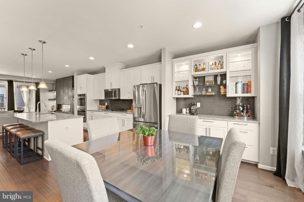 Dining room, Interior, Kitchen, Pendant Lights, Recessed Lighting, Stainless Steel Appliances, Wood Texture Flooring