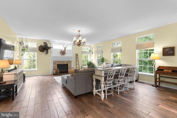 Chandelier, Dining room, Fireplace, Interior, Living room, Wood Texture Flooring