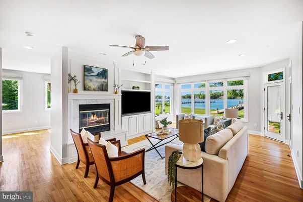 Fireplace, Interior, Living room, Recessed Lighting, Water, Wood Texture Flooring