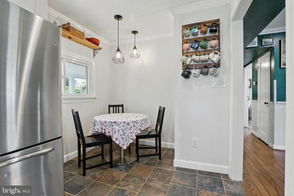Dining room, Interior, Pendant Lights, Stainless Steel Appliances, Wood Texture Flooring