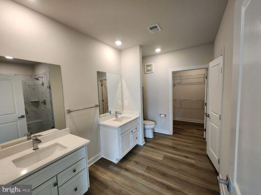 Bathroom, Dual Sink Vanities, Glass Shower, Interior, Recessed Lighting, Wood Texture Flooring