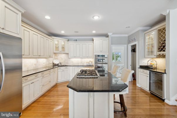 Dining room, Interior, Kitchen, Recessed Lighting, Stainless Steel Appliances, Wood Texture Flooring