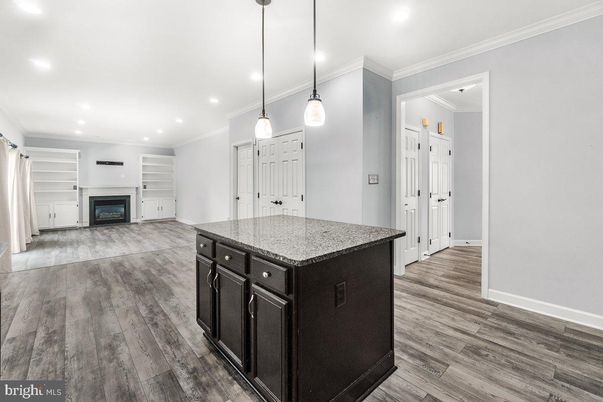 Fireplace, Interior, Kitchen, Pendant Lights, Recessed Lighting, Wood Texture Flooring