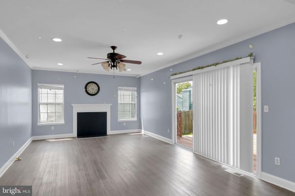 Empty room, Fireplace, Interior, Recessed Lighting, Wood Texture Flooring
