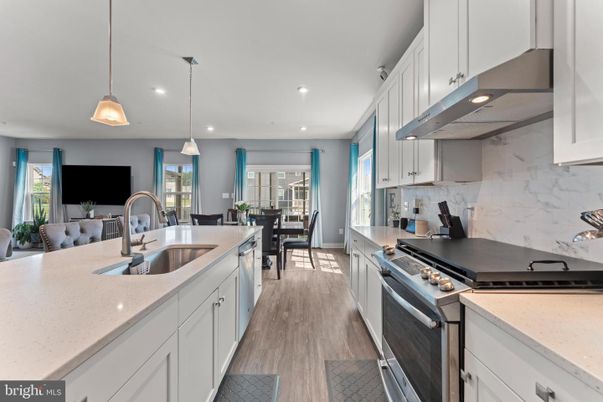 Dining room, Interior, Kitchen, Pendant Lights, Recessed Lighting, Stainless Steel Appliances, Wood Texture Flooring