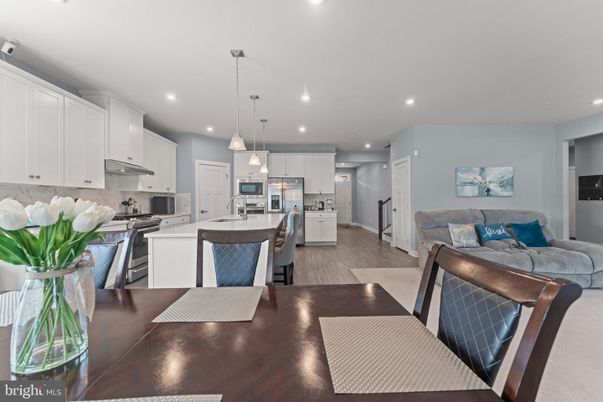 Dining room, Interior, Kitchen, Living room, Pendant Lights, Recessed Lighting, Stainless Steel Appliances, Wood Texture Flooring