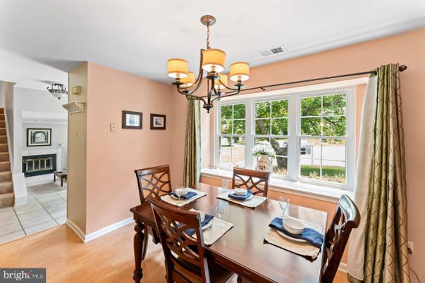 Chandelier, Dining room, Fireplace, Interior, Wood Texture Flooring