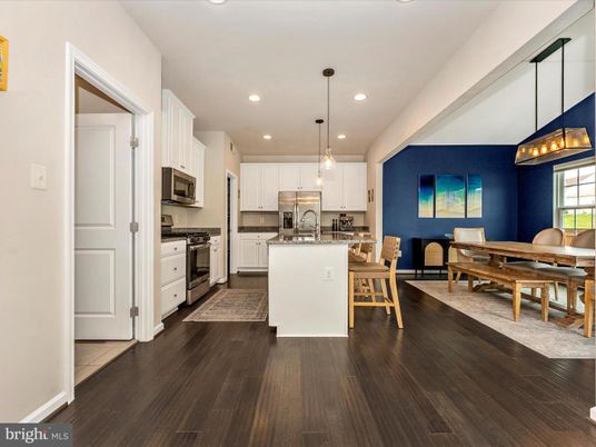 Dining room, Interior, Kitchen, Pendant Lights, Recessed Lighting, Stainless Steel Appliances, Wood Texture Flooring