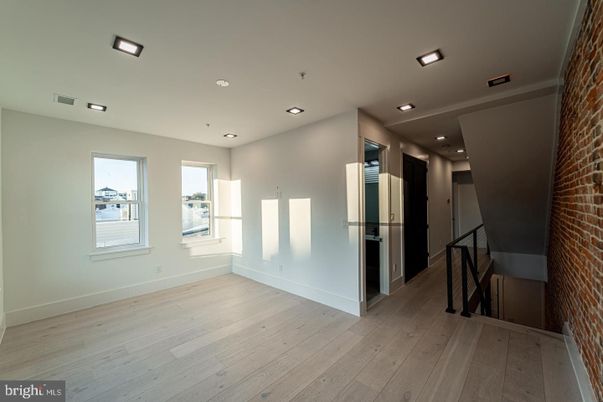 Empty room, Interior, Recessed Lighting, Stone Walls, Wood Texture Flooring