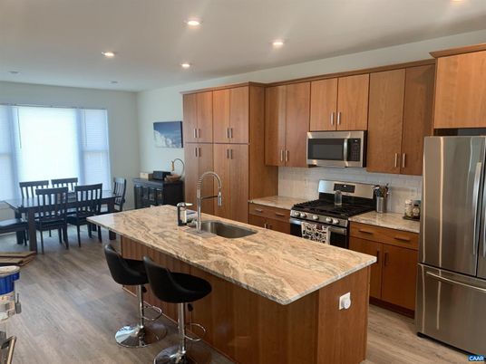 Dining room, Interior, Kitchen, Recessed Lighting, Stainless Steel Appliances, Wood Texture Flooring