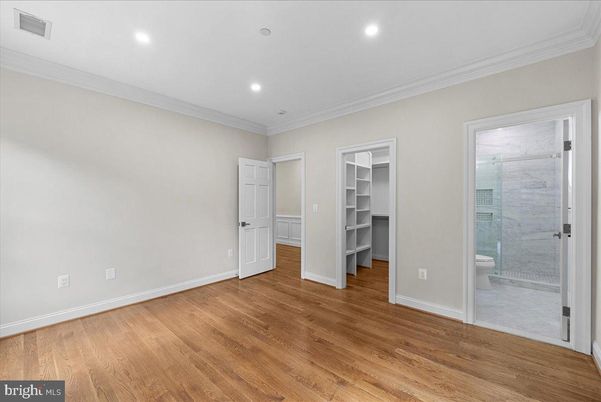 Bathroom, Empty room, Glass Shower, Interior, Recessed Lighting, Wood Texture Flooring