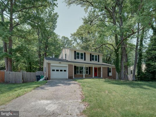 Attached, Backyard, Exterior, Facade, Brick Facade, Raised Ranch