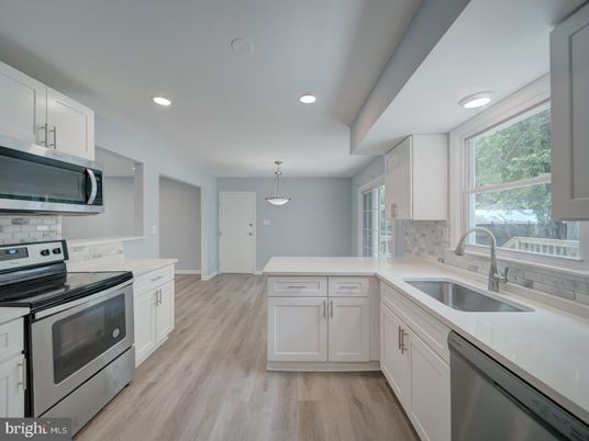 Interior, Kitchen, Pendant Lights, Recessed Lighting, Stainless Steel Appliances, Wood Texture Flooring