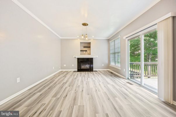 Empty room, Fireplace, Interior, Pendant Lights, Wood Texture Flooring