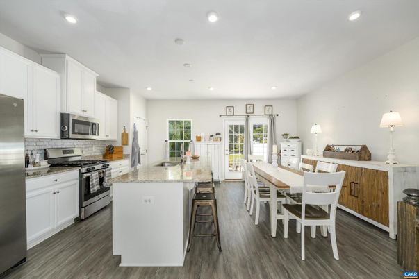 Dining room, Interior, Kitchen, Recessed Lighting, Stainless Steel Appliances, Wood Texture Flooring