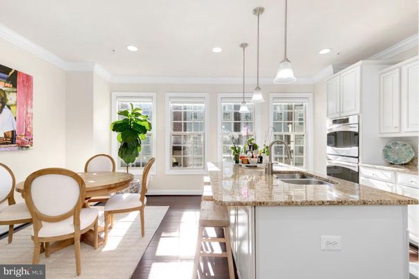 Dining room, Interior, Kitchen, Pendant Lights, Recessed Lighting, Stainless Steel Appliances, Wood Texture Flooring