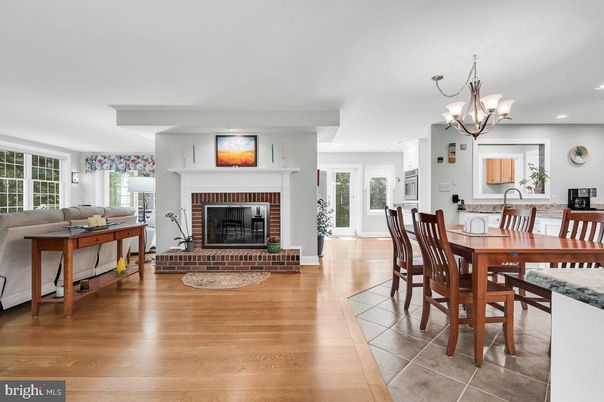 Chandelier, Dining room, Fireplace, Interior, Living room, Recessed Lighting, Wood Texture Flooring
