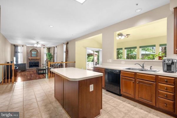 Fireplace, Interior, Kitchen, Living room, Recessed Lighting, Wood Texture Flooring
