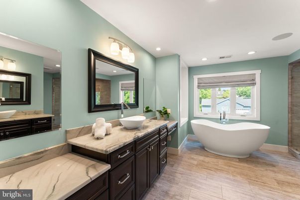 Bathroom, Dual Sink Vanities, Free Standing Baths, Interior, Recessed Lighting, Wood Texture Flooring