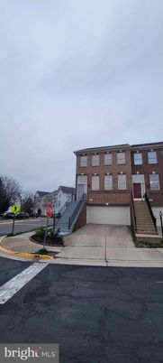 Attached, Exterior, Facade, Brick Facade, Condo Building