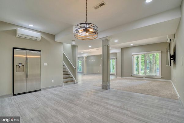 Chandelier, Elevator, Empty room, Interior, Pendant Lights, Recessed Lighting, Wood Texture Flooring